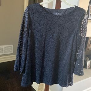 AGB long sleeve black lace top. Lined bottice.